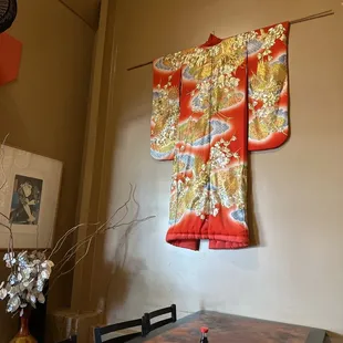 a table with a vase of flowers on it