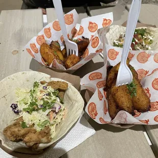 Insanely delicious jerk fried fish tacos and yellow plantains