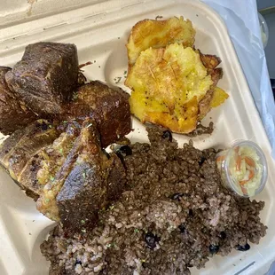 Beef tassot, diri kole (Haitian rice &amp; peas), and bannan (fried green plantains)