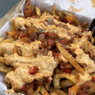 Cajun Fires with Crawfish sautéed with peppers, onions, cheese, remoulade, spicy hot sauce over fries!! Sooooooo good and wet!!!!!