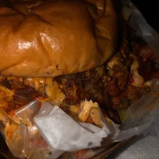 Cajun  Burger( sautéed crawfish, onions, peppers, with lettuce, and topped with franks red hot, chili aioli)