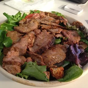 Black &apos;N&apos; Blue salad! Steak, blue cheese, blue cheese dressing, caramel used onions...