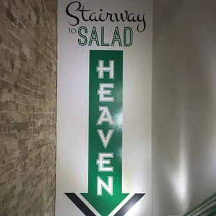 a sign that says stairway to salad heaven