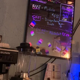 a menu on the wall of a restaurant