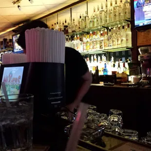 a bartender mixing a drink