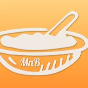 a bowl of yogurt with a spoon in it