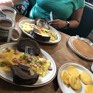 Western Omelette w/ rye toast. Sides of mush and a pancake.