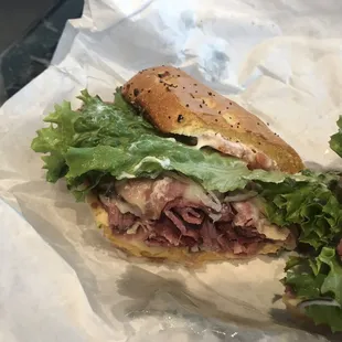 Pastrami on onion roll with the works