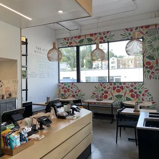 a kitchen and dining area with a large window