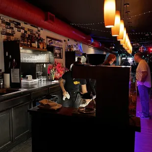 a man preparing food in a restaurant