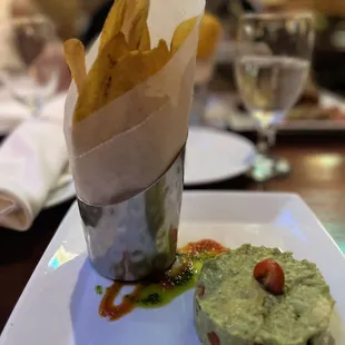 Appetizer: Guacamole and plantain chips.