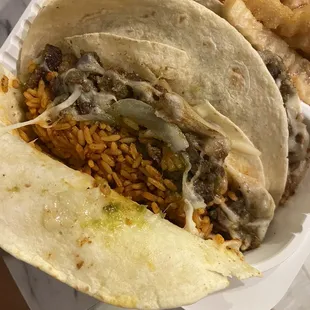 Jollof Rice w/ Suya tacos