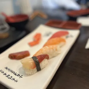 a plate of sushi on a table