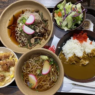three bowls of food on a tray