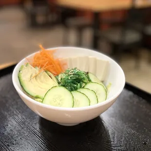 Tofu Salad Tofu, lettuce, cucumber, carrots, avocado, seaweed, with Yuzu Ponzu dressing (Yuzu-citrus based dressing)