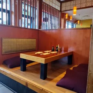 a table and benches in a restaurant