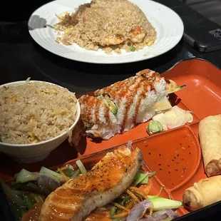 Salmon Bento Box, Spring Rolls, Fried Rice, and Shrimp Tempura Roll.