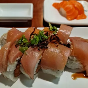 Jessica Alba roll with a side of fresh salmon sashimi &amp; tall cold Kirin