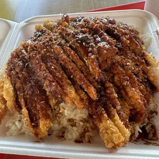 Spicy sesame chicken combo no veggies extra sauce.