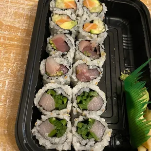 Bottom to top: - yellowtail jalapeno roll - dynamite roll - alaska roll