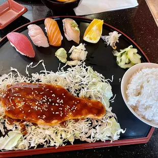 Salmon Teriyaki with sushi.
