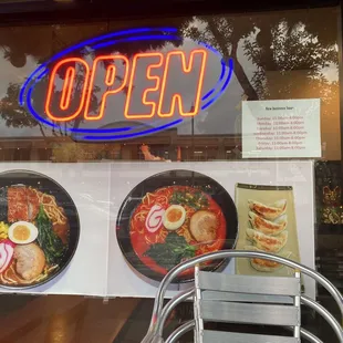 an open sign in the window