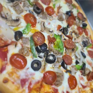 Yummy Supreme Pizza  I also got $2.00 off while I was there during happy hour 4 pm to 7 pm