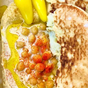 fresh and well seasoned hummus, baked pita and peppers