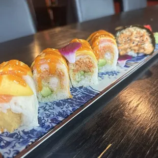 Mango Tango roll and Spicy Salmon hand roll