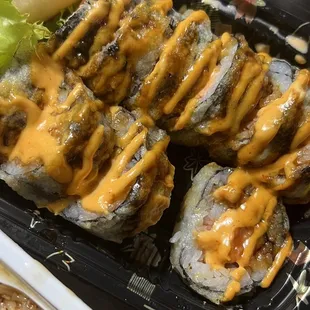 a plate of sushi and rice