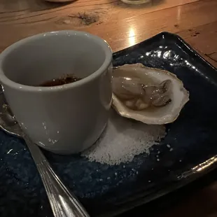 1 fresh oyster on the half shell with Shiso, Togarshi, Ponzu