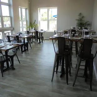 A more private dining area, on the left when you walk in.