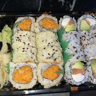 Spicy Salmon Roll + Philadelphia Roll