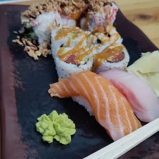 Combo A. Crunchy roll, spicy tuna roll, salmon and snapper nigiri