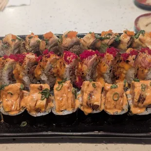 Top: White dragon Middle: Red dragon Bottom: Black &amp; tan  All of them   amazing sauces and super fresh fish perfectly seared albacore