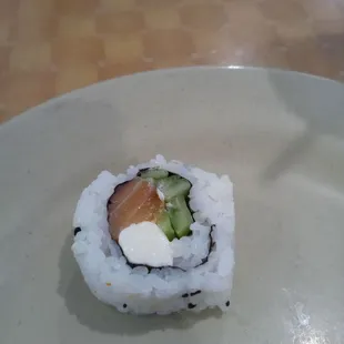 a sushi roll on a plate