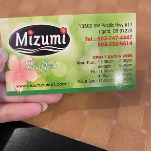 Business card : phone number, address, hours