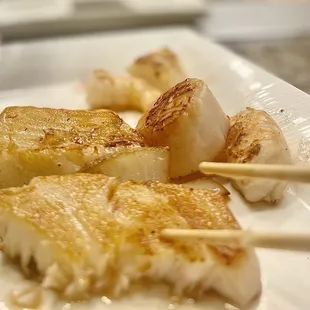Chilean sea bass, black tiger shrimp, Hokkaido scallops