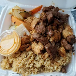 Steak and chicken very salty rice is dry