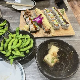 Edamame ($3.99), Agedashi Tofu ($6.99), Spider roll ($10.99), MJ roll ($14.99), Salmon avocado roll ($6.99), and Unagi avocado roll ($7.99)
