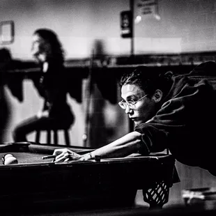 a man playing pool