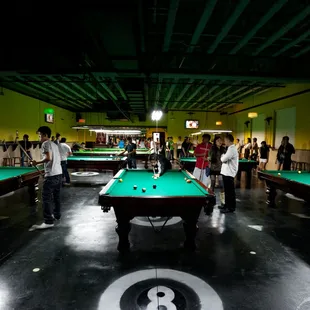 pool tables in a pool hall