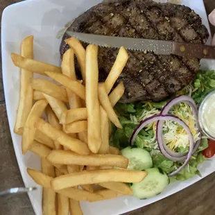 Sirloin steak, fries, side salad.