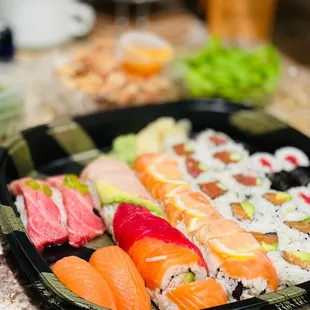 Sake, O toro, rainbow roll, 49er roll, salmon avo roll, spicy tuna roll, tekka maki, seaweed salad, chicken karaage, edamame