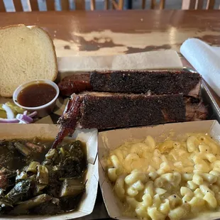 Collard greens, Mac and cheese, sausage, brisket, and ribs. 3 meat plate.