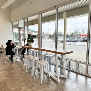a woman sitting at a table