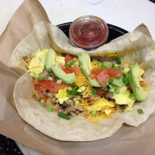 MJ's Famous breakfast burrito no beans, no meat and salsa on the side.
