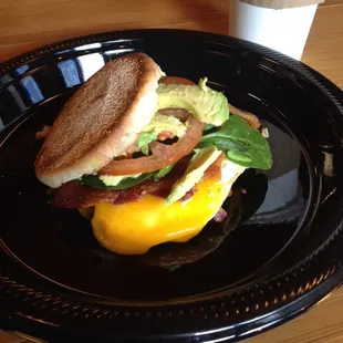 Sunrise Express with bacon $3.75.  Added avocado, tomato and spinach at a reasonable price  delicious!