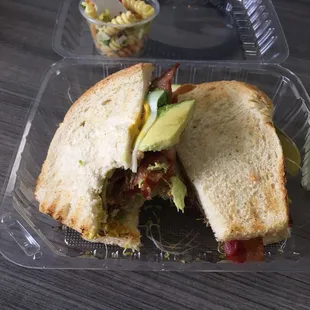 a sandwich in a plastic container