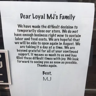 a sign in the window